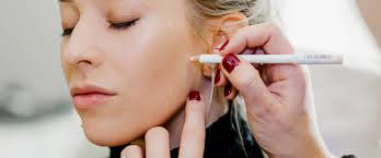 Pribilof pen being used on a woman face