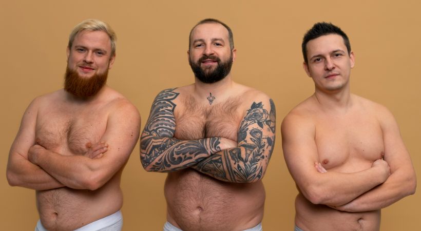 A group of men showcasing their bodies