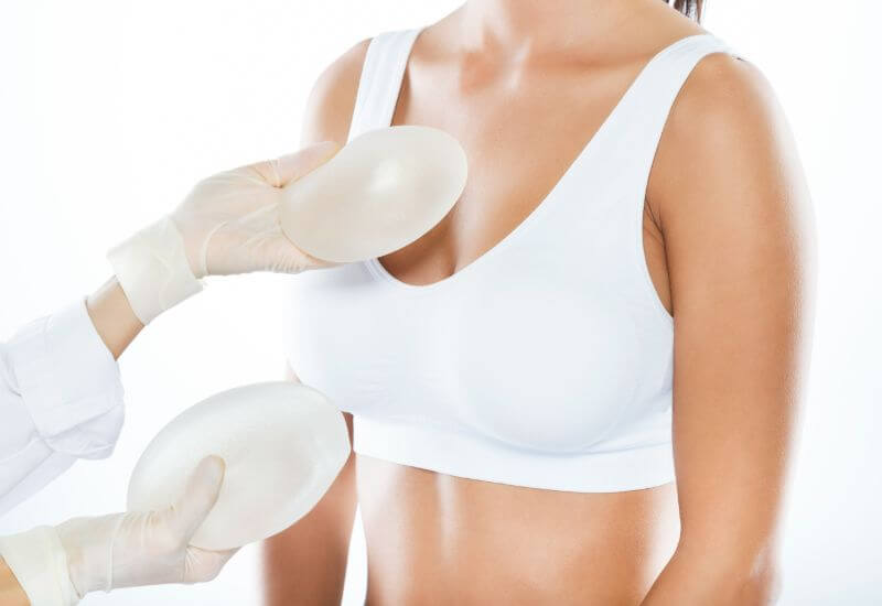 a woman with breast implants