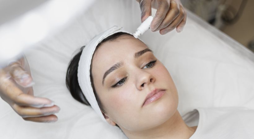 woman getting microneedling